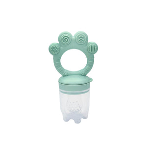 The NubiTeethe™ Multi-Flow Teether Bottle is a teal and clear food-grade silicone feeder with a ring handle and textured patterns, designed to soothe baby gums and help introduce solid foods.