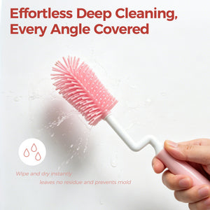 A hand uses the PureFlow™ FlexAngle Bottle Brush Set with an ergonomic pink silicone handle to wipe water droplets off a white surface. Text highlights effortless deep cleaning and mold prevention.